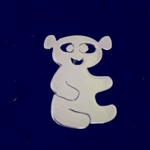 Handmade Sterling silver bear pin.